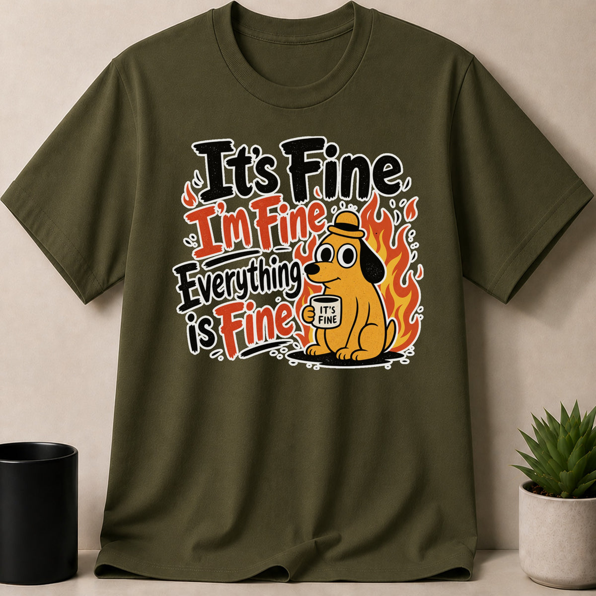 Olive green t-shirt with "It's Fine I'm Fine Everything is Fine" text and a dog with a mug.