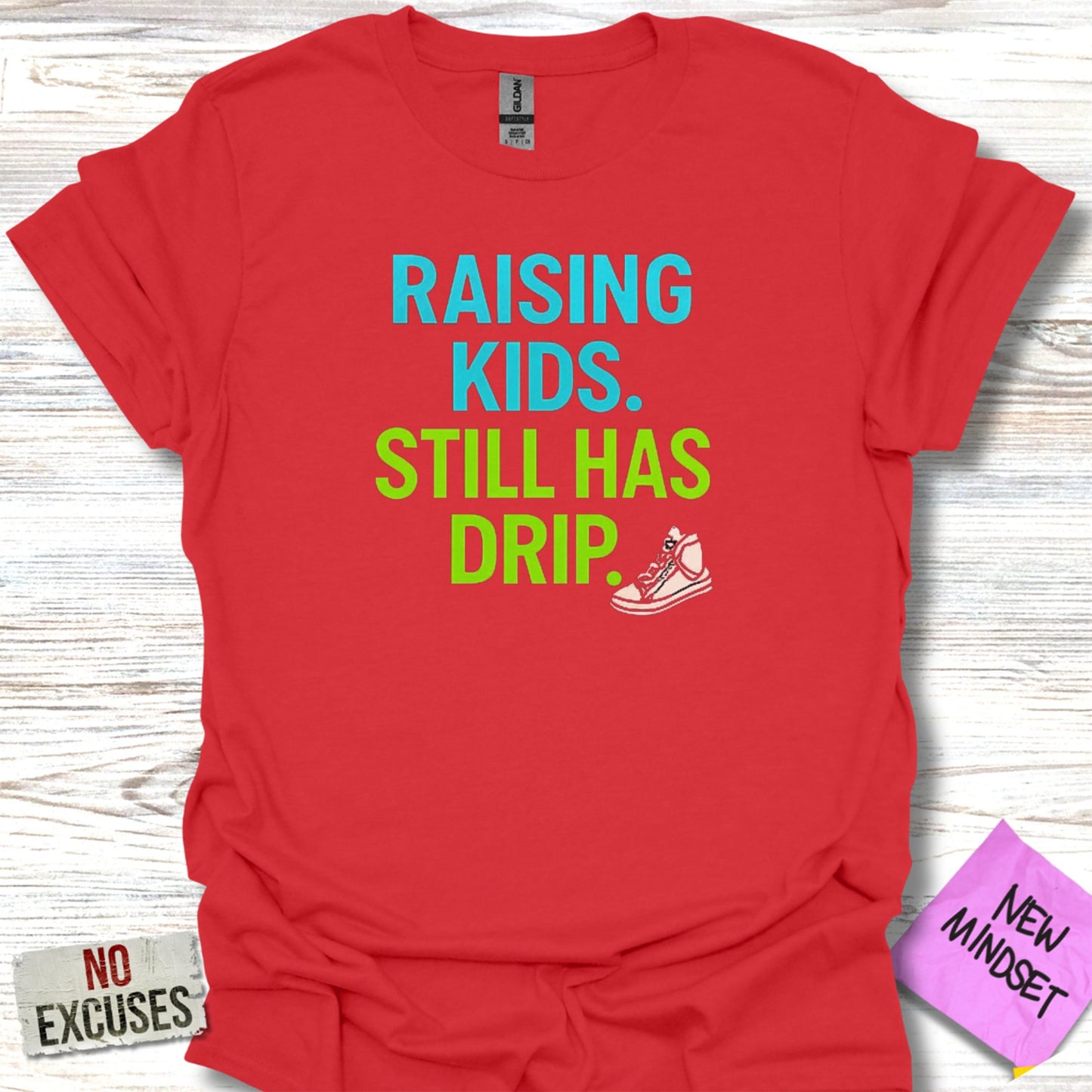 Raising Kids Still Has Drip Graphic Tee product