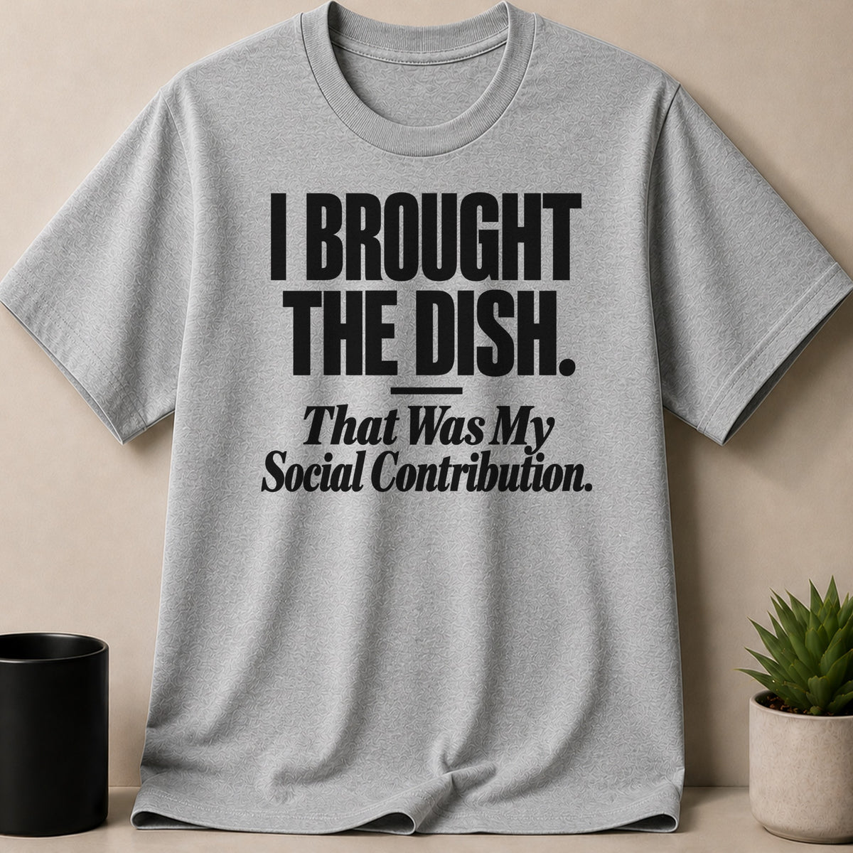 Heather gray crewneck t-shirt featuring black text that reads I BROUGHT THE DISH. That Was My Social Contribution.