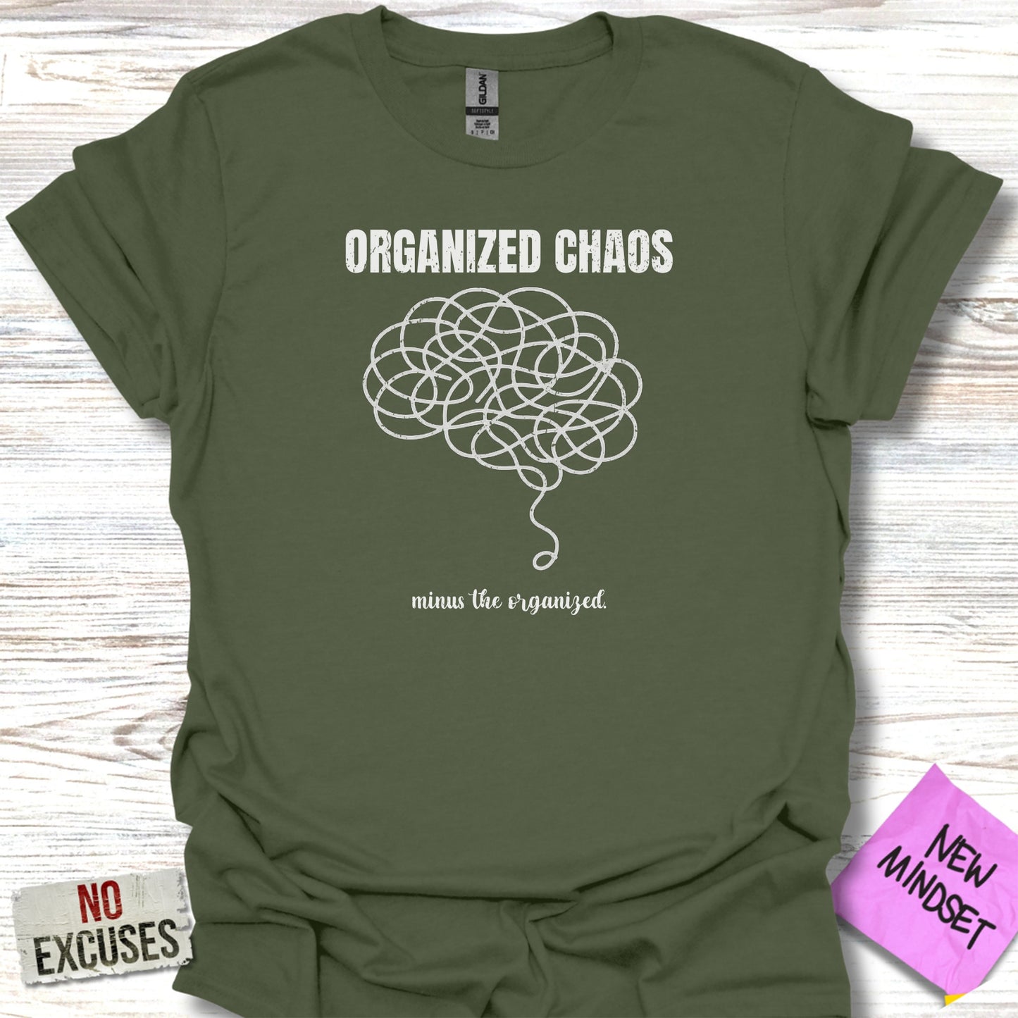 Green t-shirt with "ORGANIZED CHAOS" and a tangled brain design.
