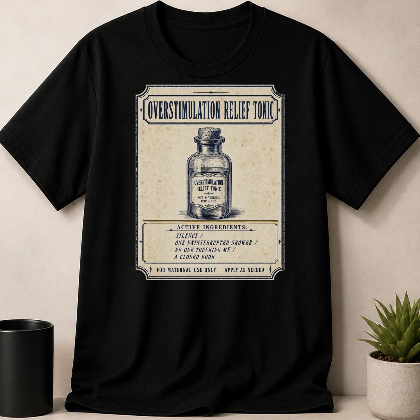 Black t-shirt with "Overstimulation Relief Tonic" design featuring a vintage bottle and ingredients list.