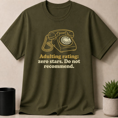 Green t-shirt with vintage rotary phone and text "Adulting rating: zero stars. Do not recommend."