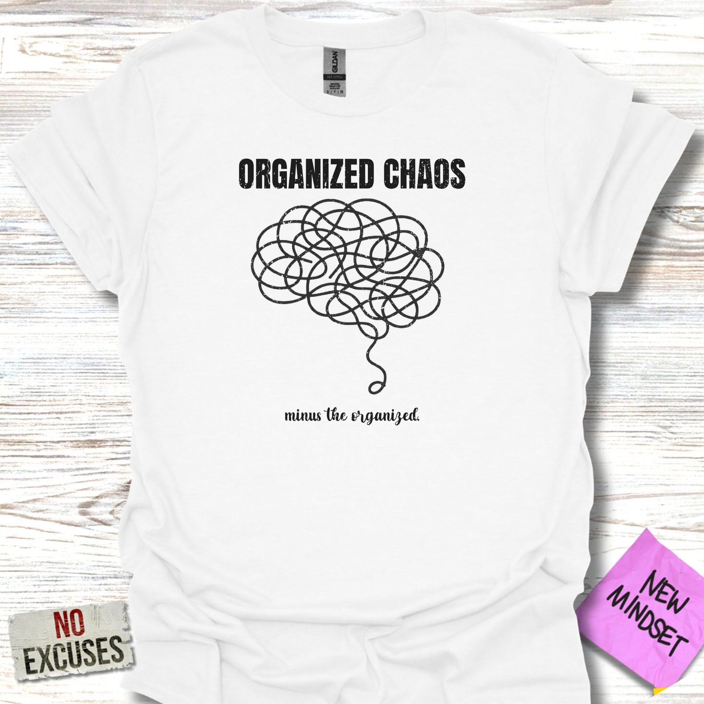 White t-shirt with black graphic of tangled lines forming a brain, "ORGANIZED CHAOS" and "minus the organized."