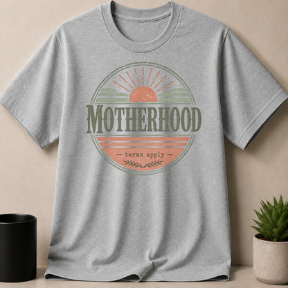 Gray t-shirt with "Motherhood" graphic featuring sun and stripes, and "- terms apply -" text.