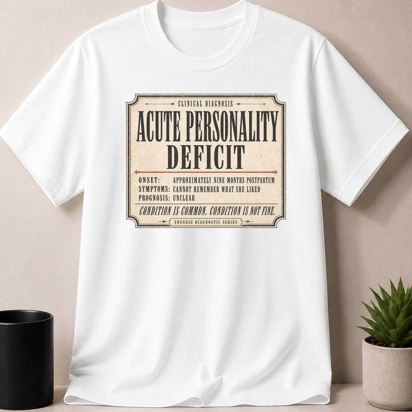 White t-shirt with "Acute Personality Deficit" and diagnostic details on a vintage label.