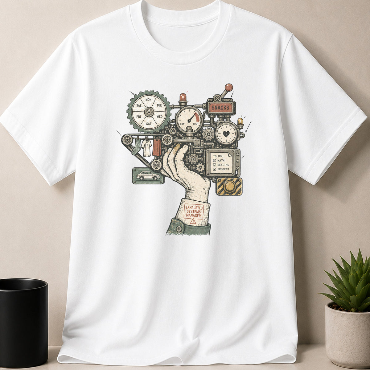 White t-shirt with a mechanical illustration of a hand labeled "Exhausted Systems Manager" holding a complex machine.