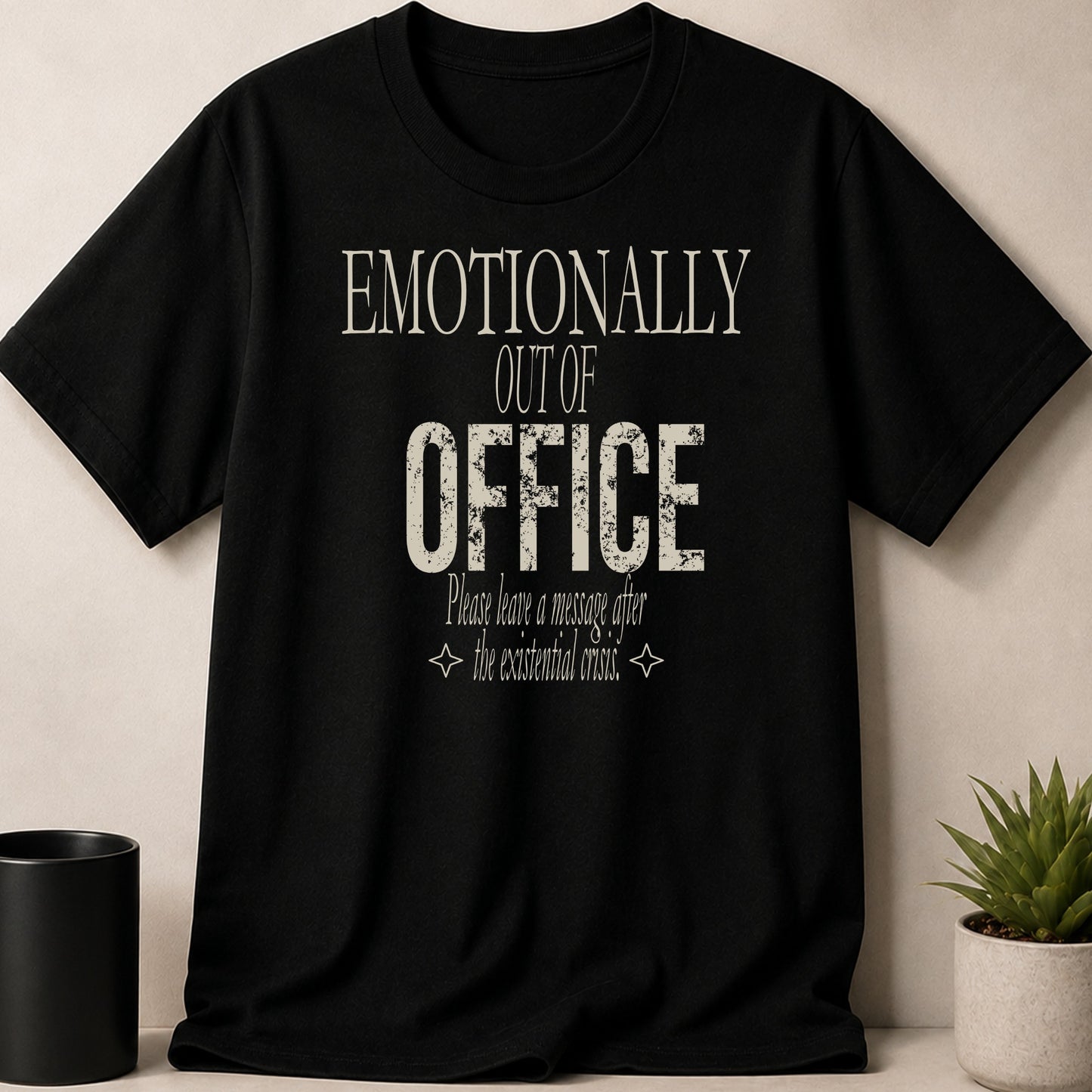 Black t-shirt with "Emotionally Out of Office" and "Please leave a message..." text.