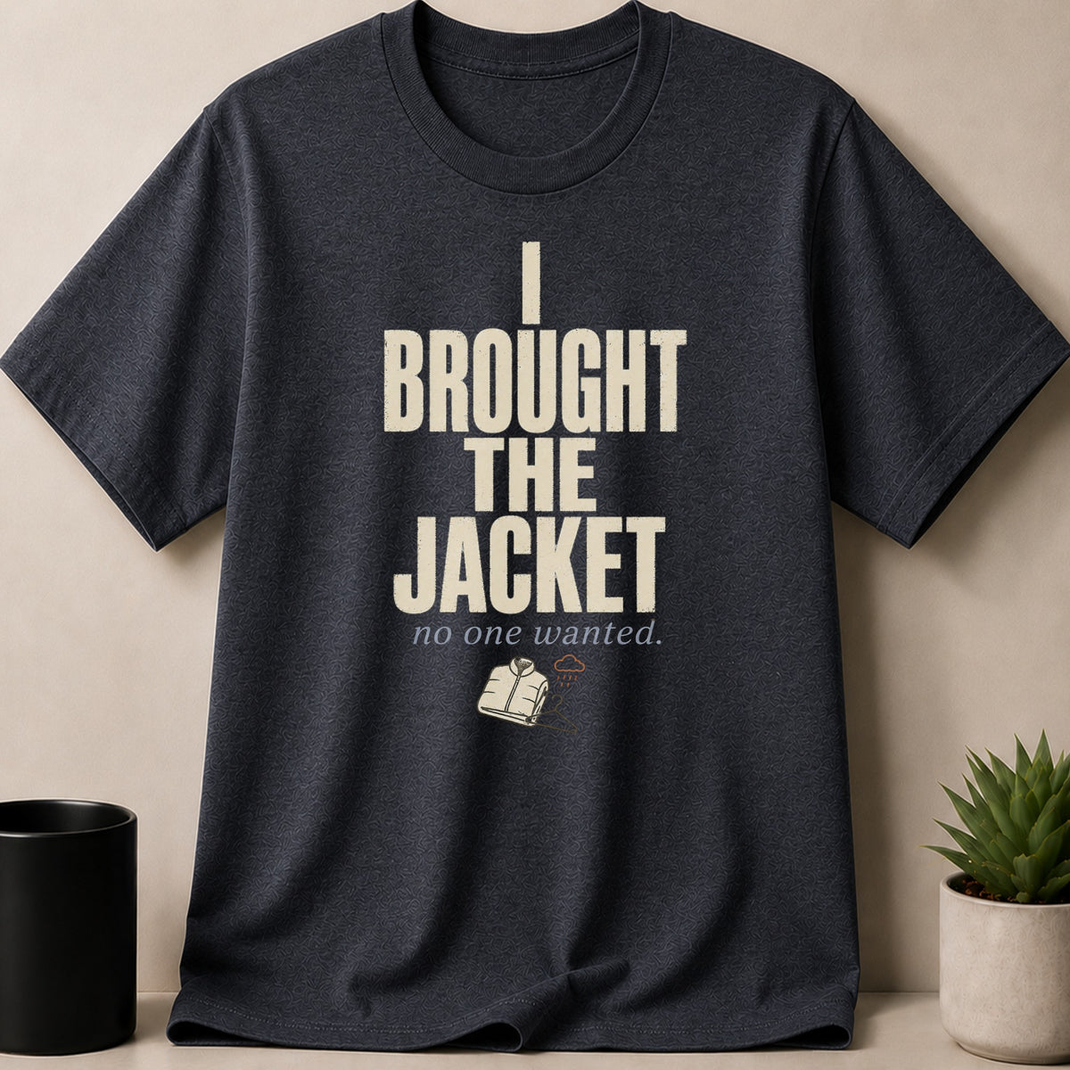 Dark t-shirt with off-white text "I BROUGHT THE JACKET no one wanted" and jacket graphic.
