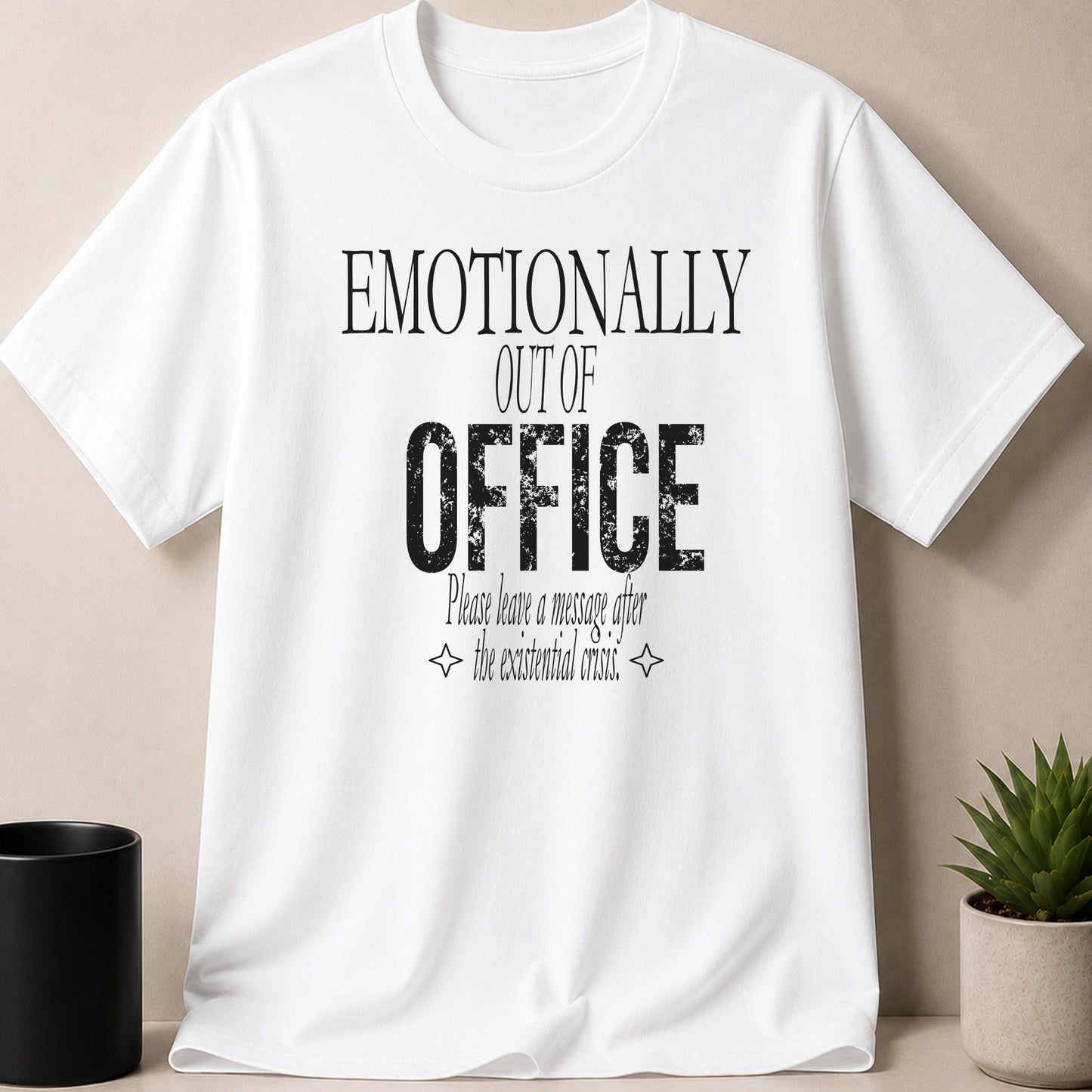White t-shirt with distressed text "Emotionally Out of Office Please leave a message after the existential crisis."