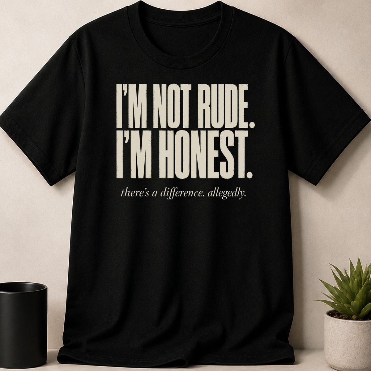 Black t-shirt with white text reading "I'M NOT RUDE. I'M HONEST. there's a difference. allegedly."