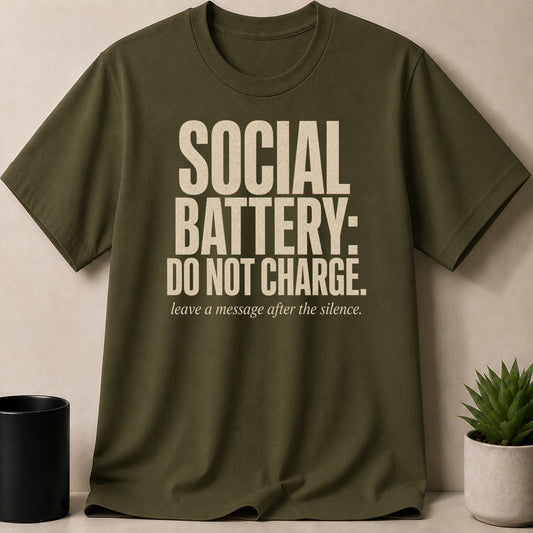 Olive green t-shirt with "SOCIAL BATTERY: DO NOT CHARGE" text.