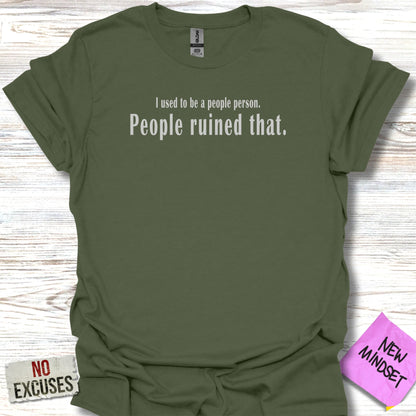 Olive green t-shirt with "I used to be a people person. People ruined that." text.
