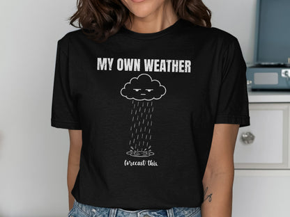 T-shirt with a grumpy cloud raining and the text "MY OWN WEATHER forecast this."