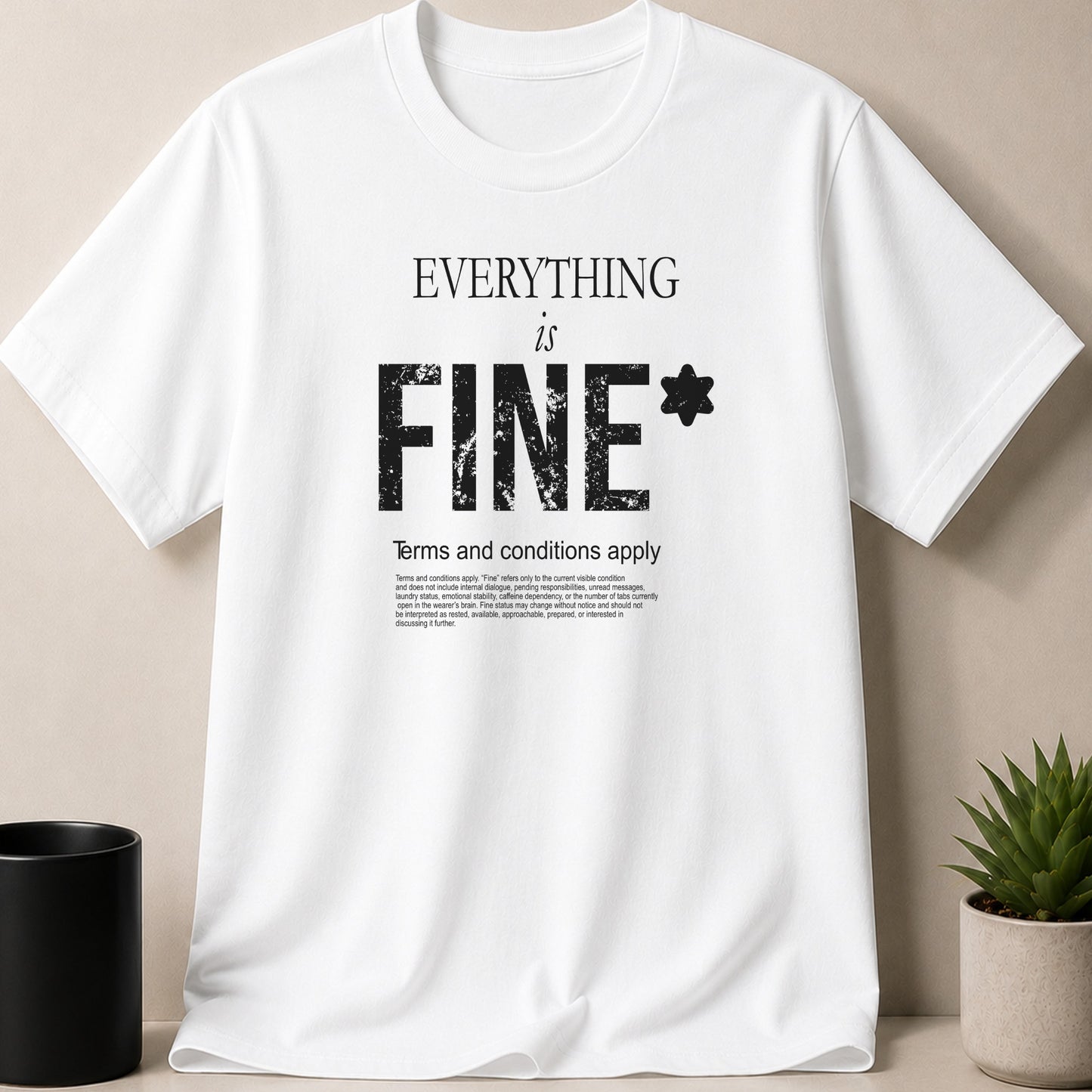 White t-shirt with "EVERYTHING is FINE*" and terms and conditions text.