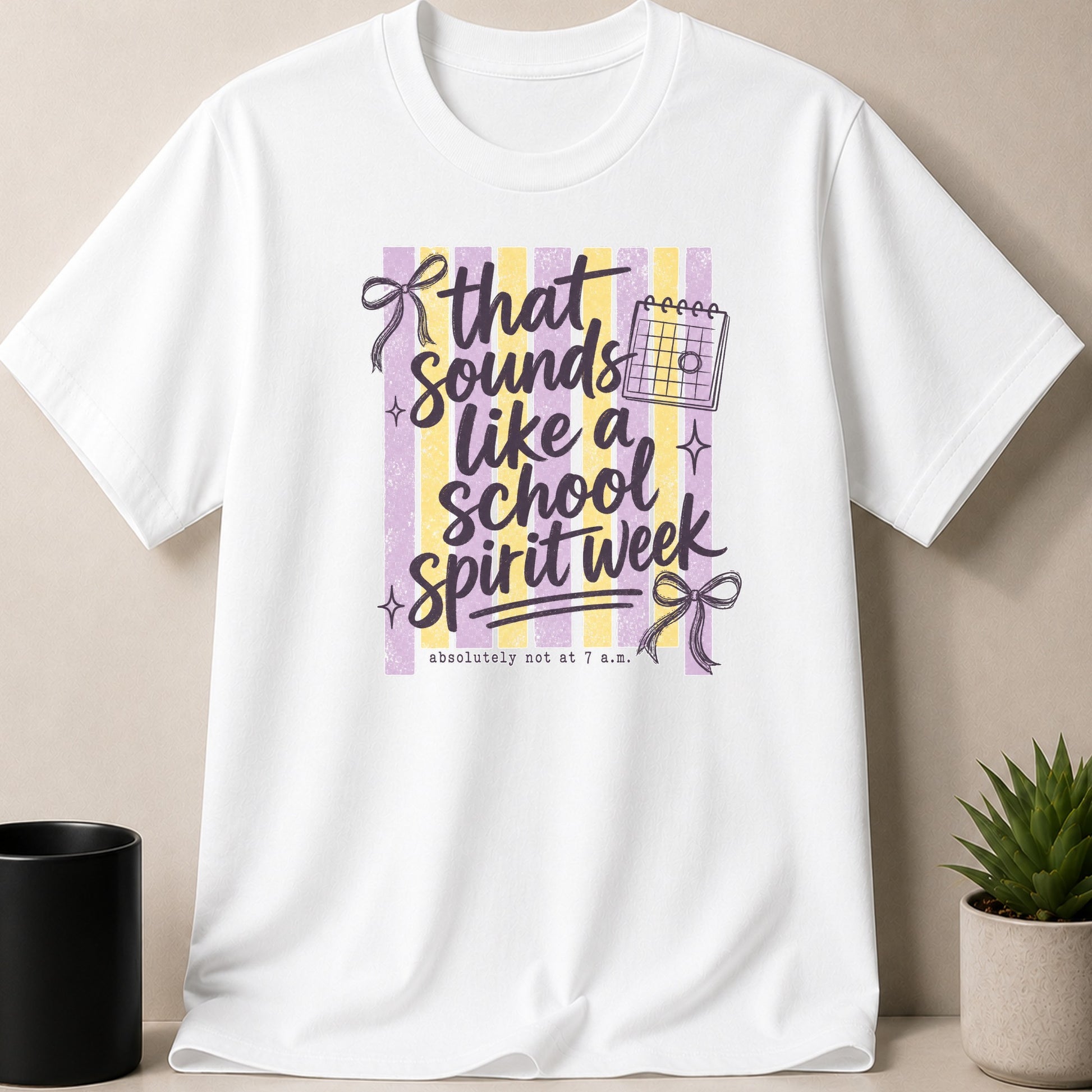 White t-shirt with purple and yellow stripes and text "that sounds like a school spirit week".