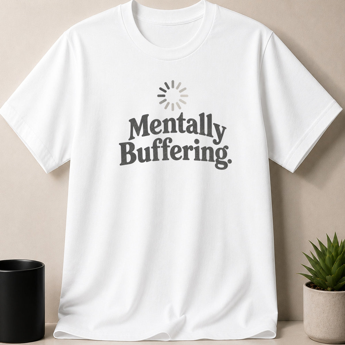 White t-shirt with "Mentally Buffering" text and a loading icon graphic.