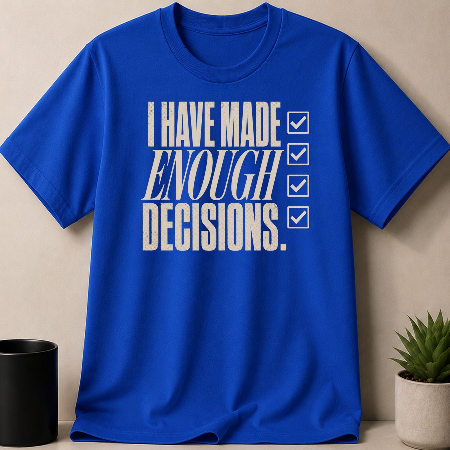 Blue t-shirt with text "I HAVE MADE ENOUGH DECISIONS." and checkmarks.