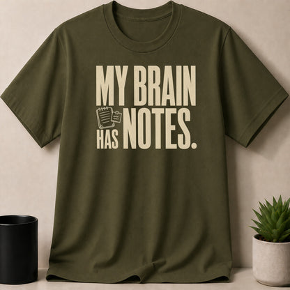 Olive green t-shirt with text "MY BRAIN HAS NOTES."