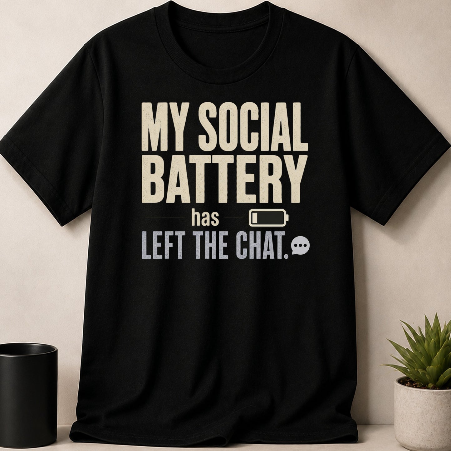 Black t-shirt with text "MY SOCIAL BATTERY has LEFT THE CHAT" and icons.