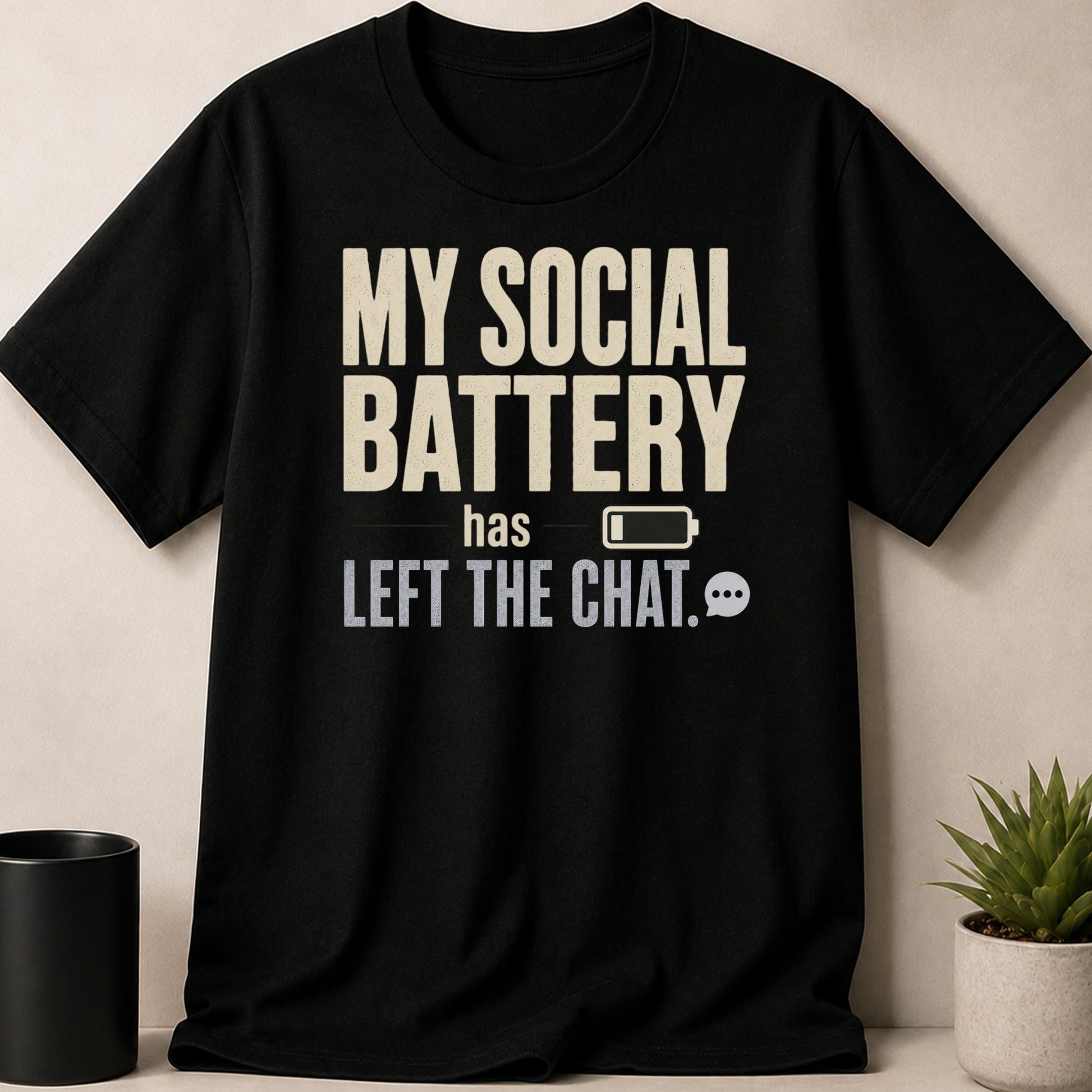 Black t-shirt with text "MY SOCIAL BATTERY has LEFT THE CHAT" and icons.
