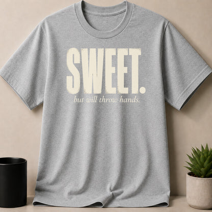 Grey t-shirt with "SWEET. but will throw hands." graphic.