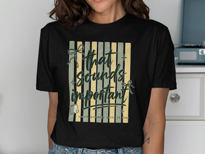 Black t-shirt with a graphic featuring striped background and text: "that sounds important, I should probably write it down"