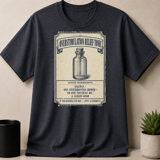 Dark Heather t-shirt — T-shirt with "Overstimulation Relief Tonic" label and ingredient list.
