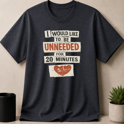 Dark t-shirt with text "I WOULD LIKE TO BE UNNEEDED FOR 20 MINUTES" and a broken heart graphic.