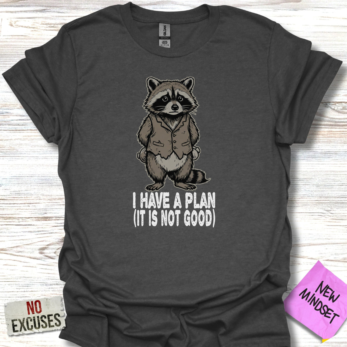T-shirt with raccoon graphic and text "I HAVE A PLAN (IT IS NOT GOOD)".