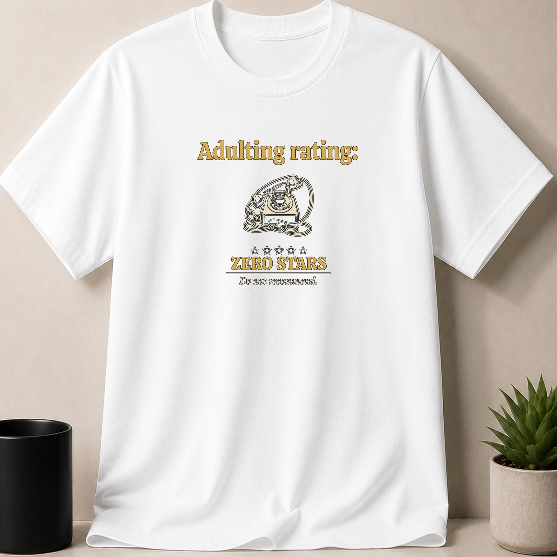 White t-shirt with "Adulting rating: ZERO STARS Do not recommend." text.