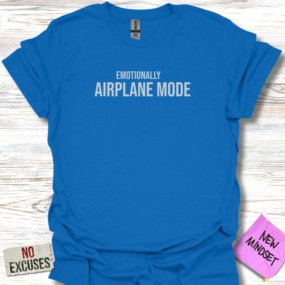 Blue t-shirt with white text "EMOTIONALLY AIRPLANE MODE".