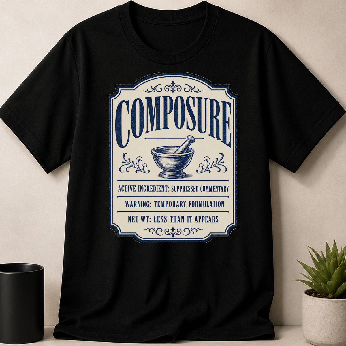 Black t-shirt with "COMPOSURE" and apothecary-style label with mortar and pestle.