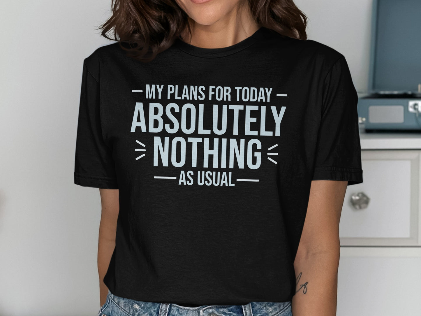 Black t-shirt with "My plans for today absolutely nothing as usual" in white text.