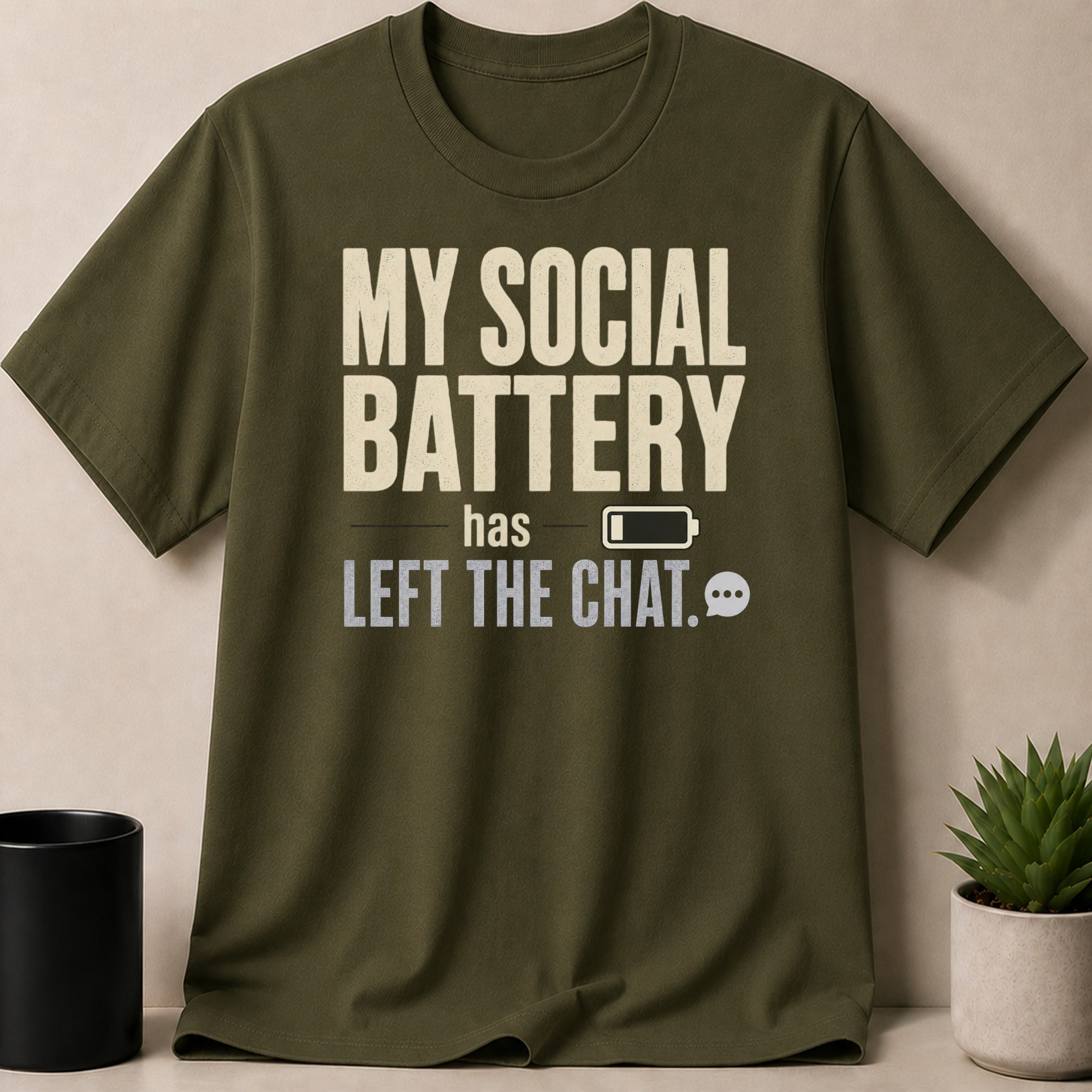 Olive green t-shirt with "MY SOCIAL BATTERY has LEFT THE CHAT." text.