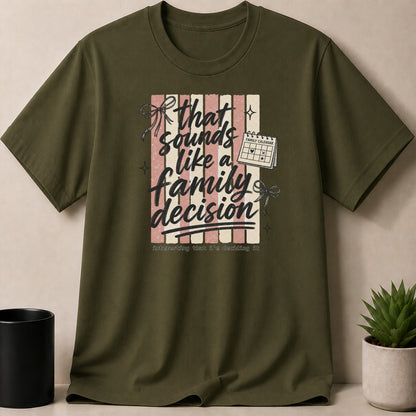 Green t-shirt with text "that sounds like a family decision" and a calendar.
