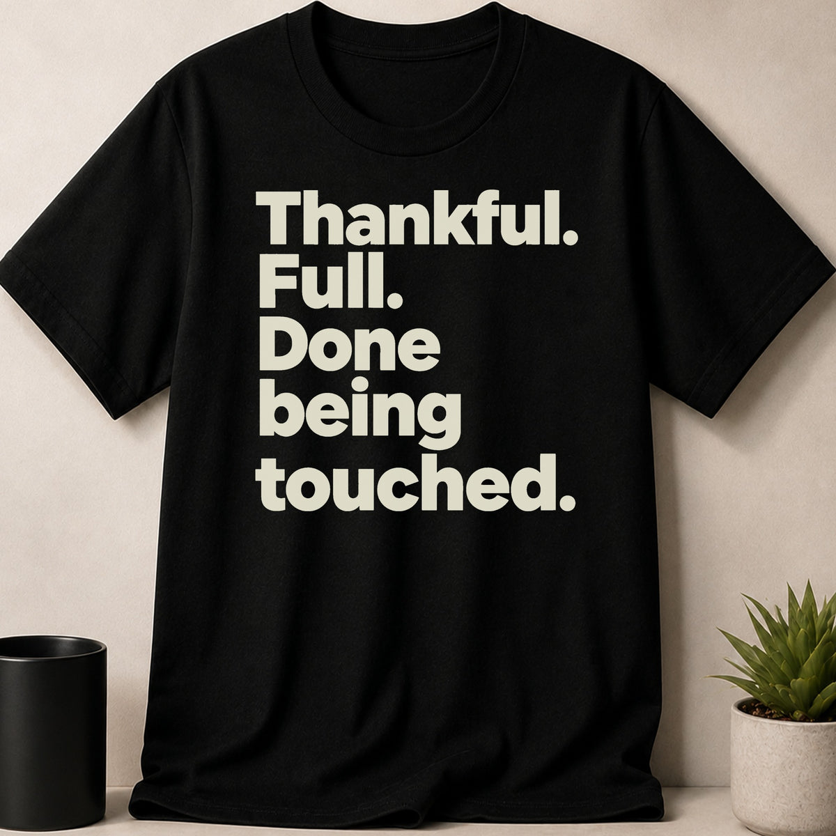 Black t-shirt with text: Thankful. Full. Done being touched.