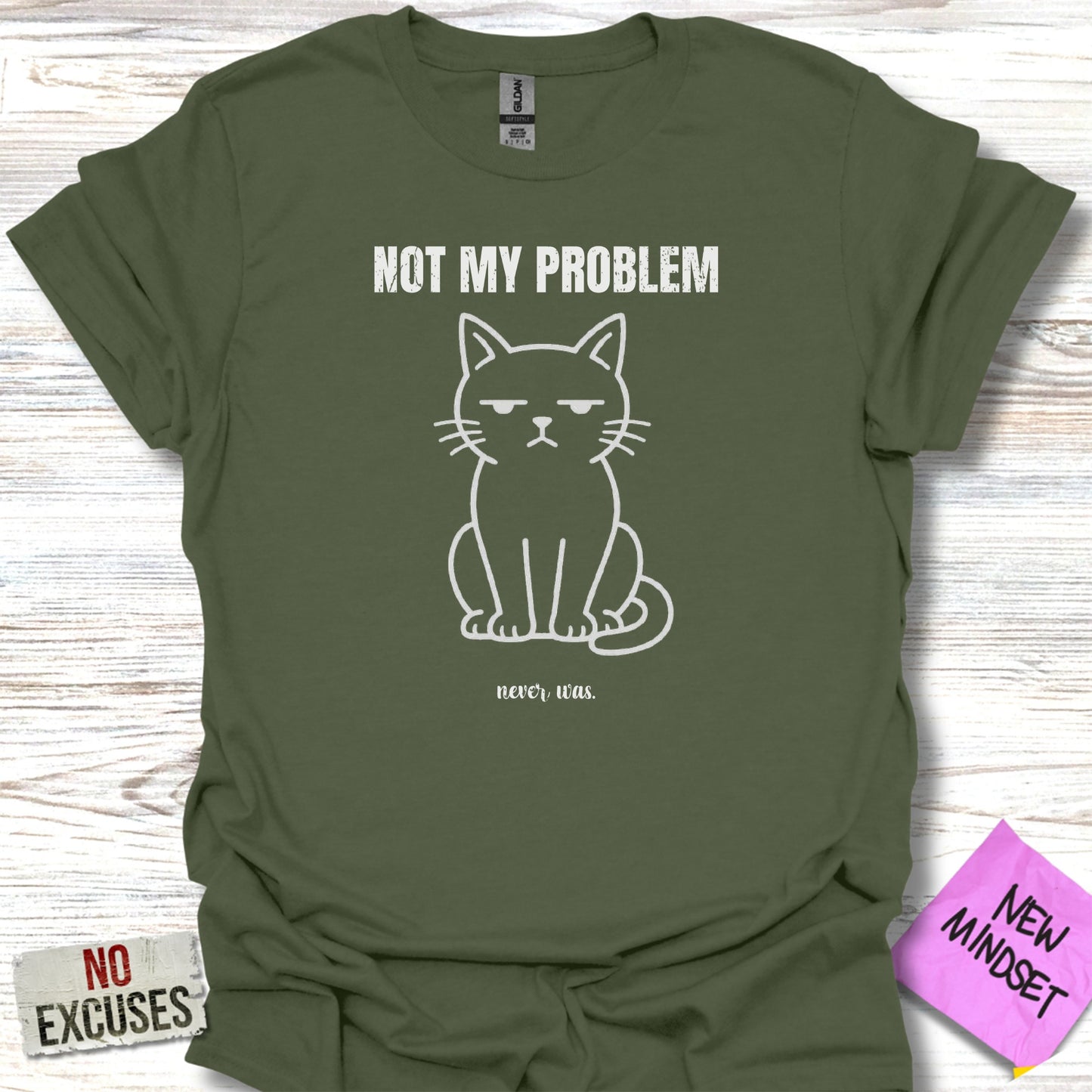 Green t-shirt with a grumpy cat graphic and "NOT MY PROBLEM" text.