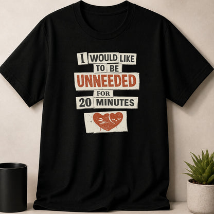 Black t-shirt with distressed text and a grumpy heart graphic.
