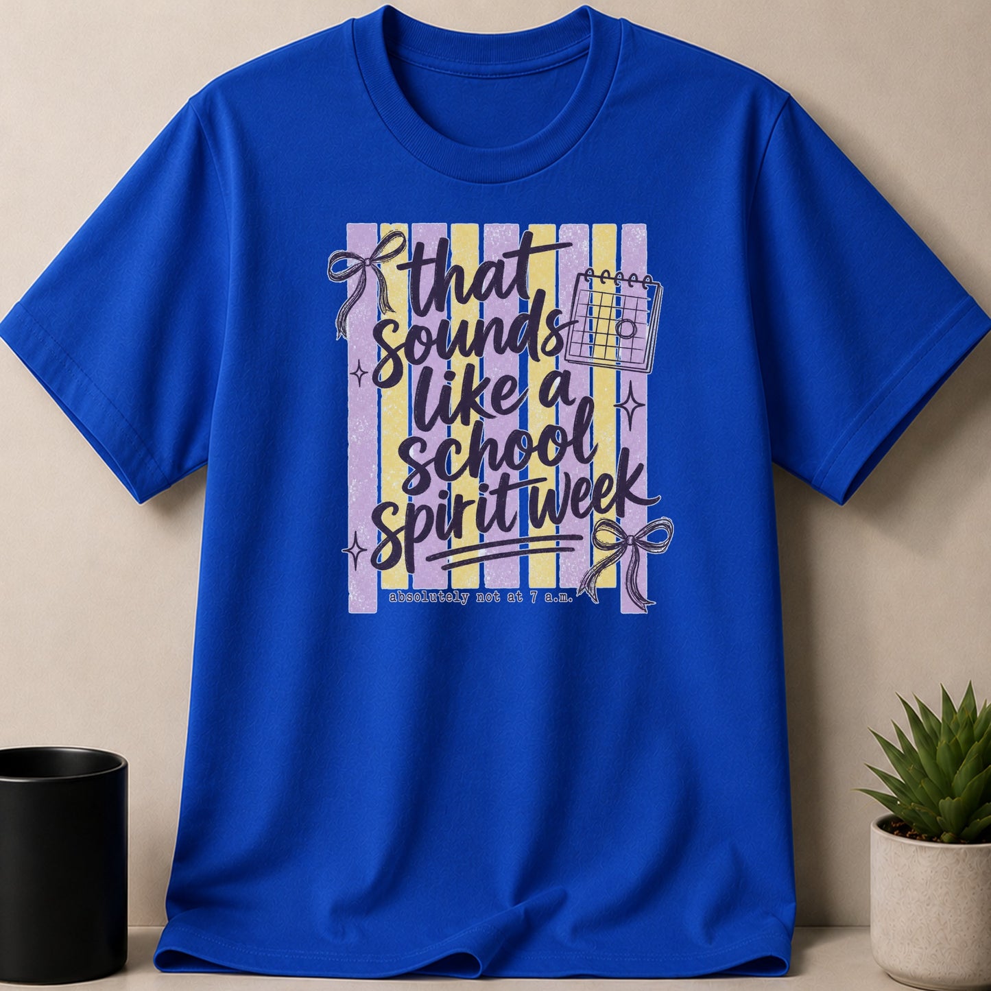 Blue t-shirt with "That sounds like a school spirit week" graphic.