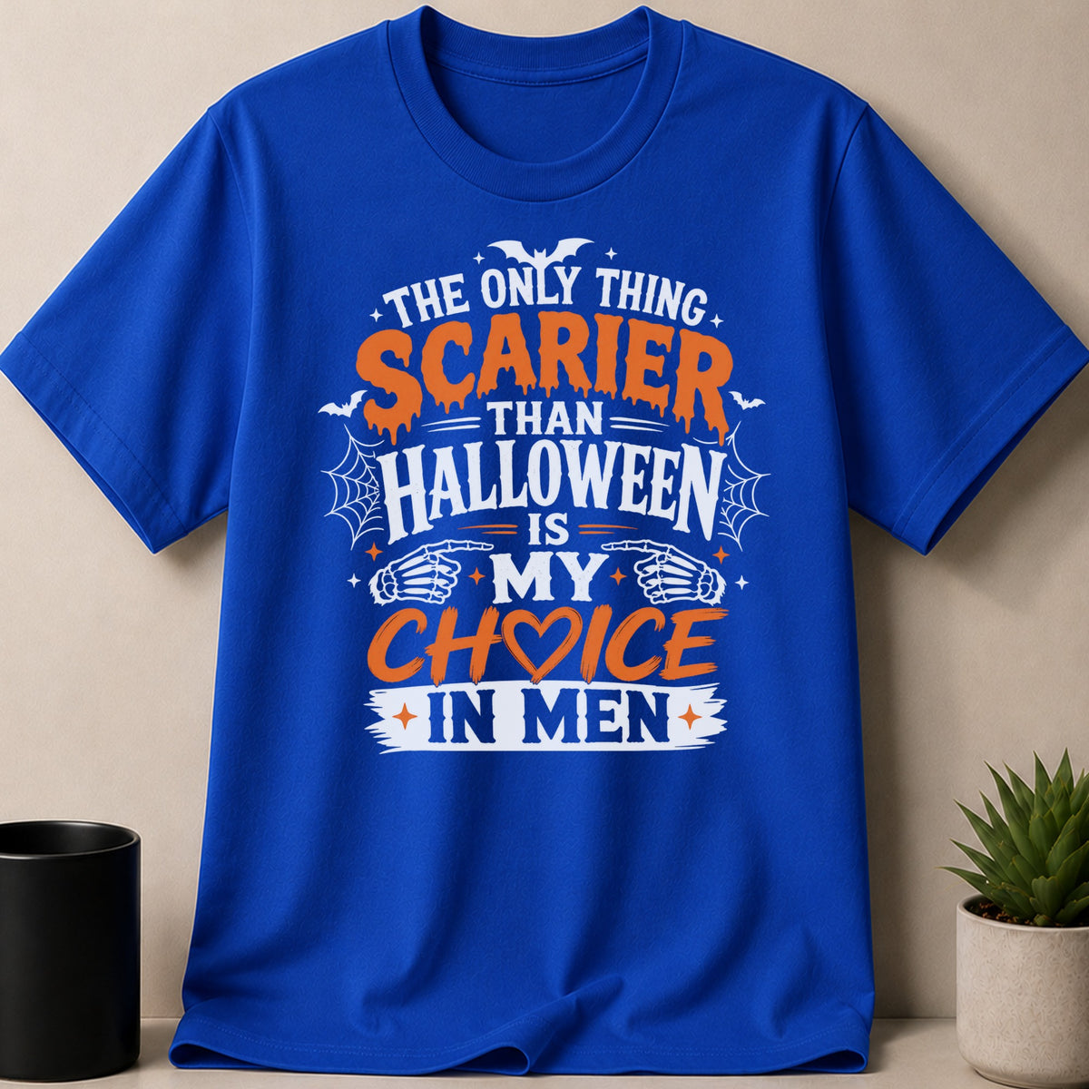 Blue t-shirt with Halloween graphic: "The only thing scarier than Halloween is my choice in men."