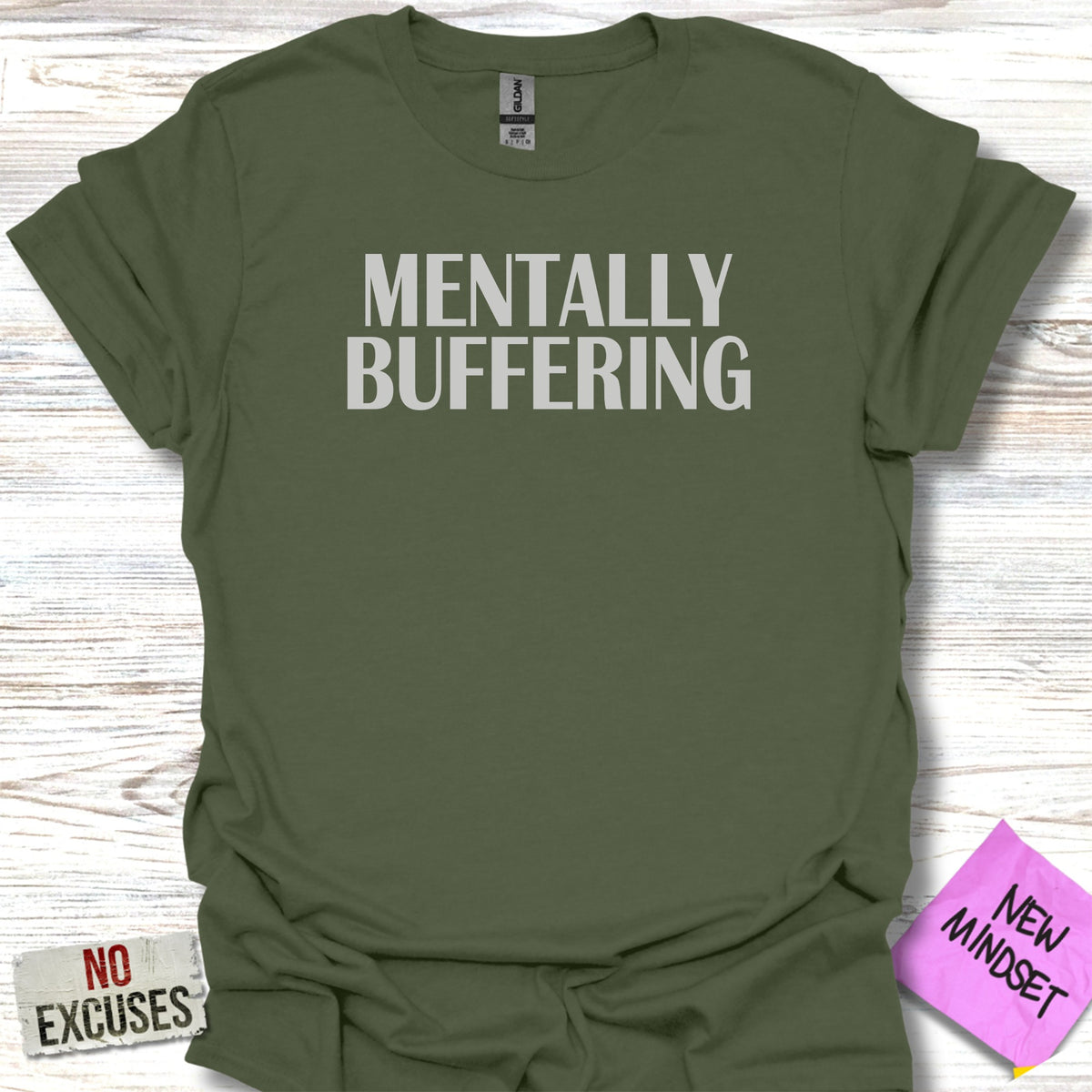 Olive green t-shirt with "MENTALLY BUFFERING" and "NO EXCUSES" text.