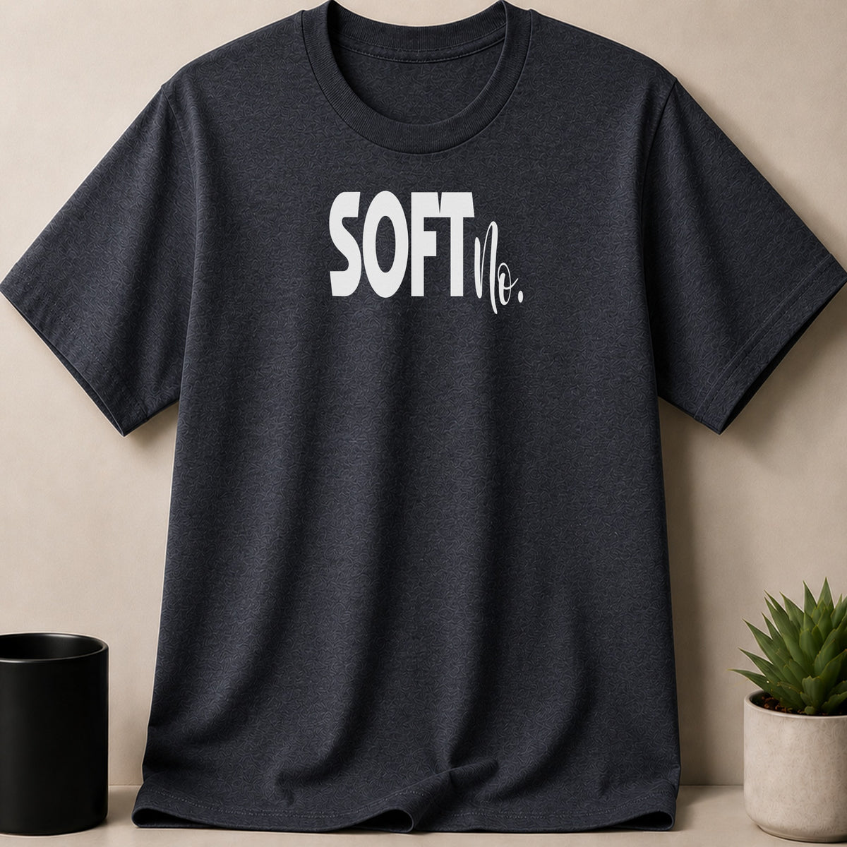 Dark gray t-shirt with white text reading "SOFTNo."