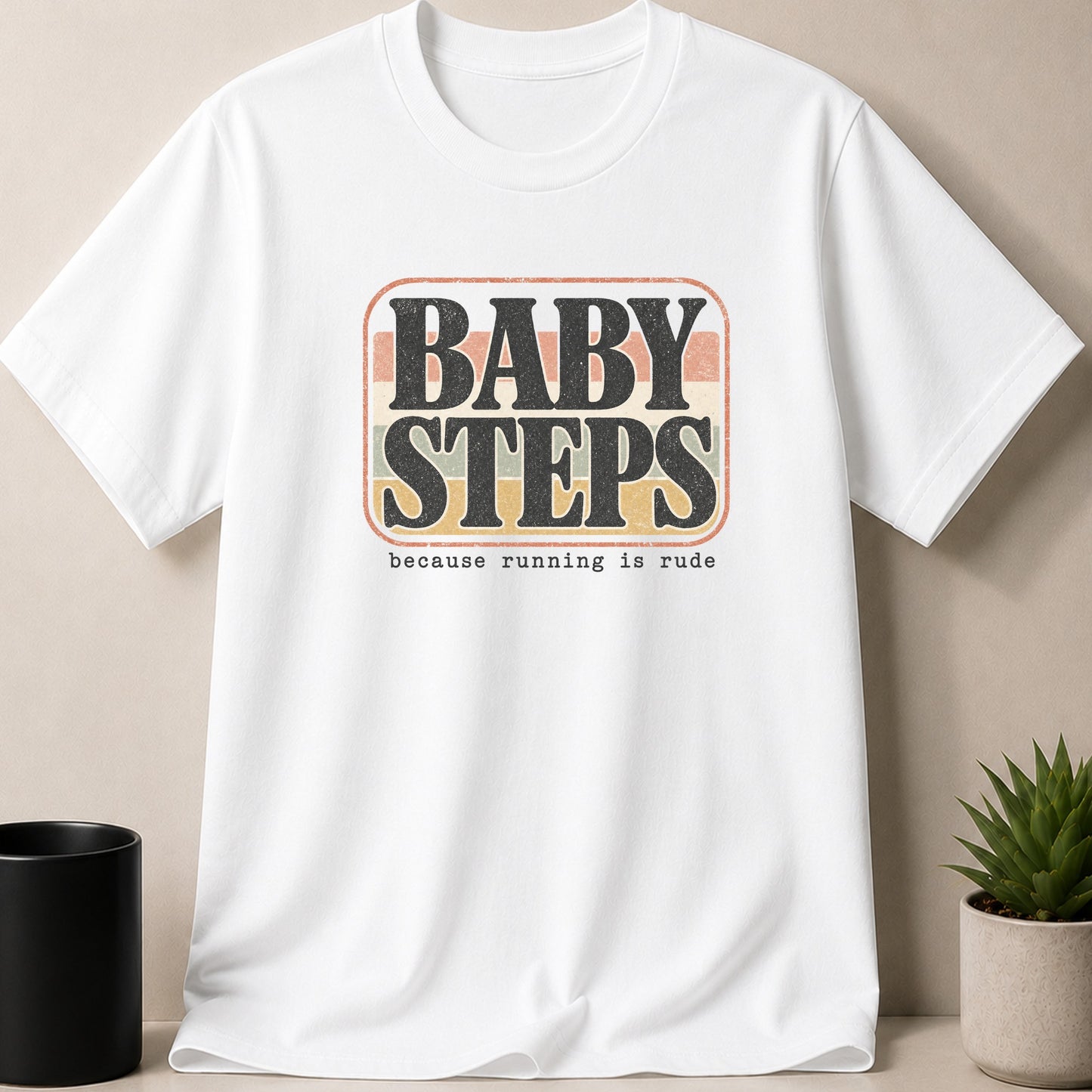 White t-shirt with distressed "BABY STEPS because running is rude" graphic.