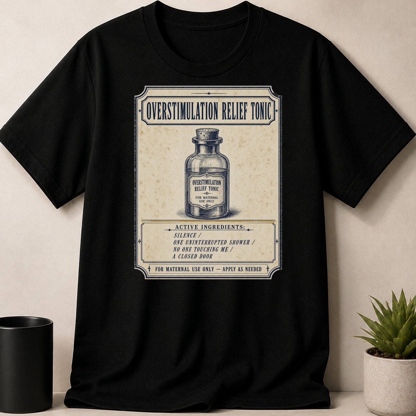 Black t-shirt with "Overstimulation Relief Tonic" design featuring a bottle and ingredients.