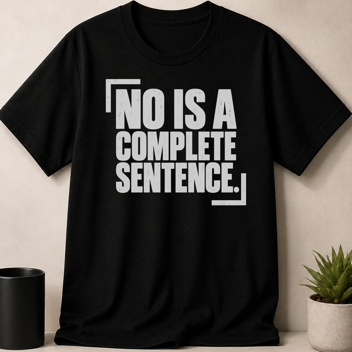 A black crewneck t-shirt featuring gray text that reads No is a complete sentence inside brackets.