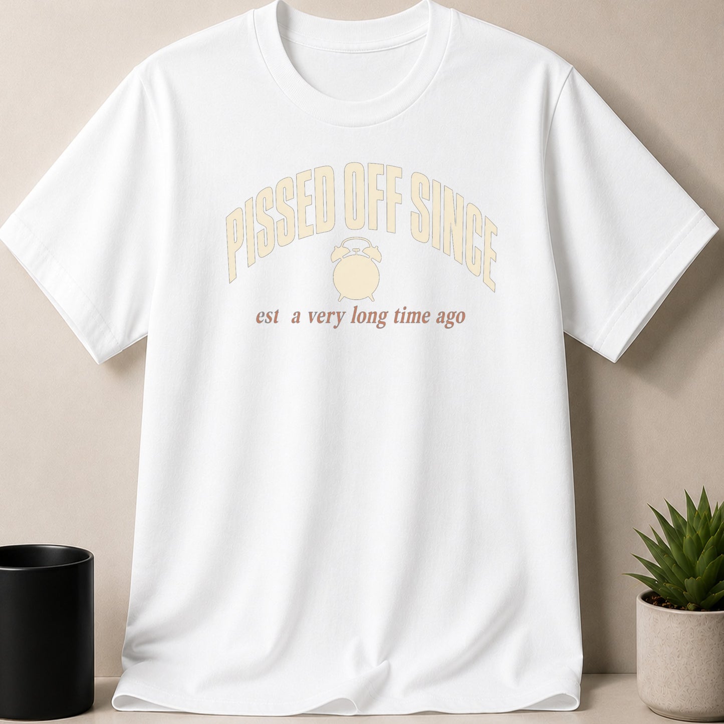 White t-shirt with "Pissed Off Since" and alarm clock graphic.