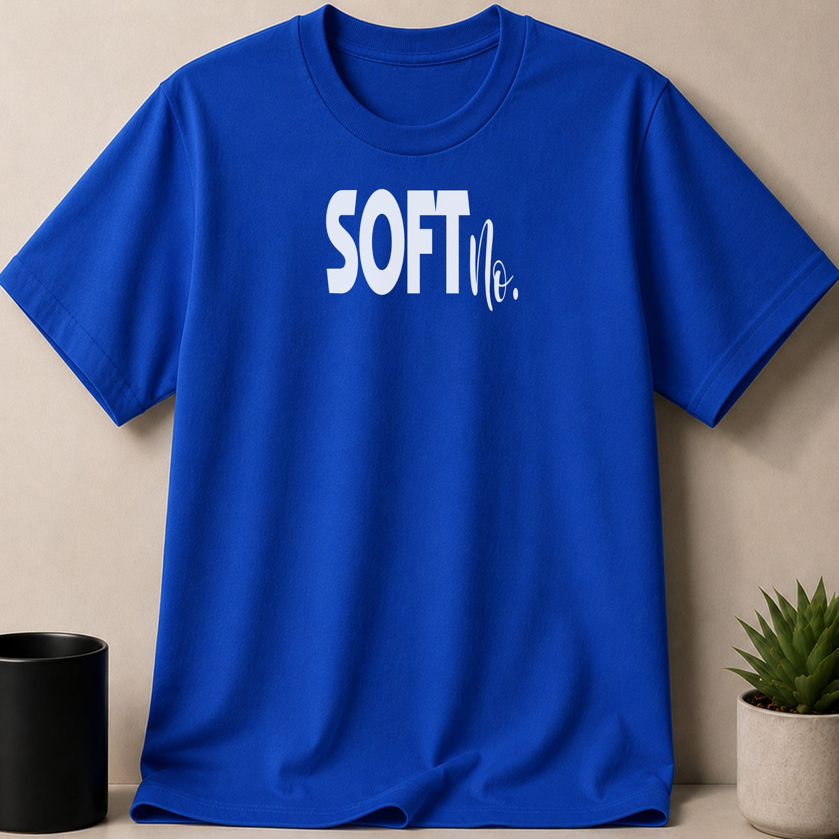 Blue t-shirt with white text that reads "SOFTno."
