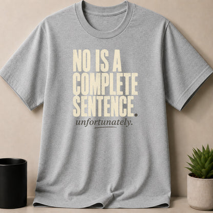 Grey t-shirt with cream text "NO IS A COMPLETE SENTENCE. unfortunately."