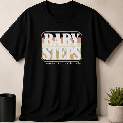 Black t-shirt with "BABY STEPS" and "because running is rude" text design.