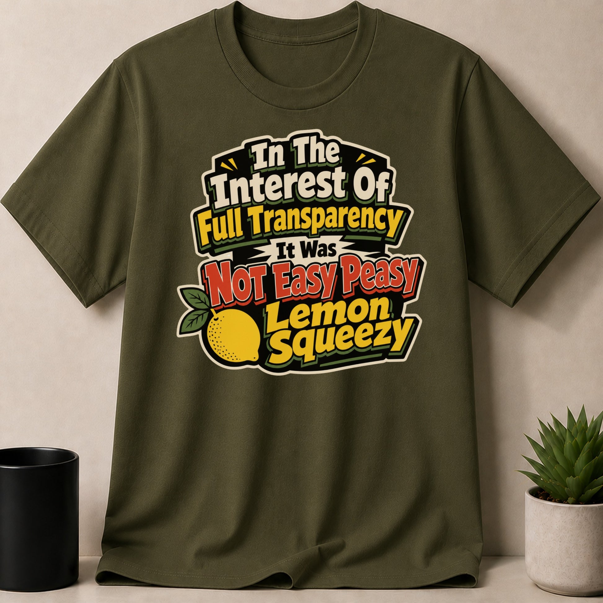 Green t-shirt with text "In The Interest Of Full Transparency It Was Not Easy Peasy Lemon Squeezy" and a lemon graphic.